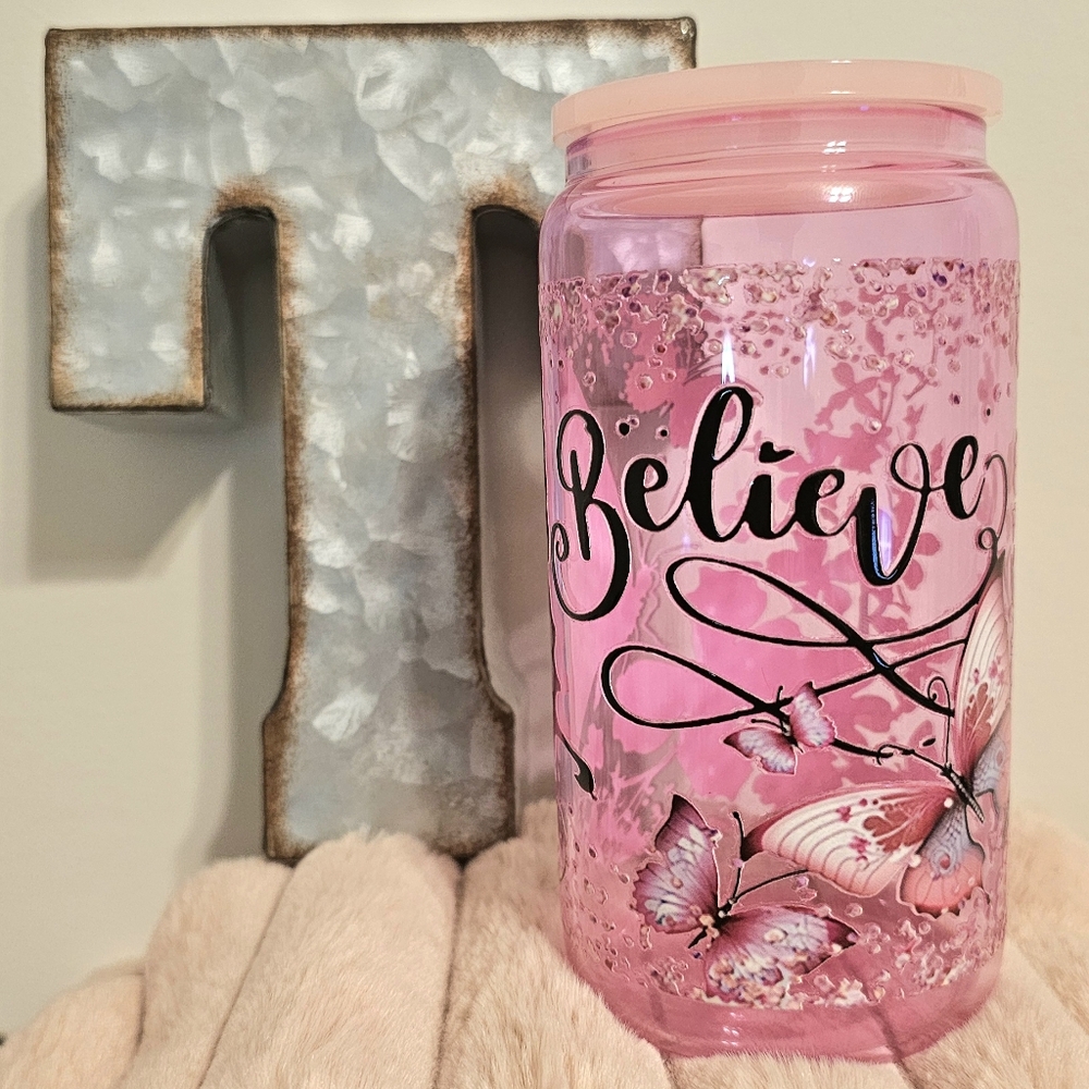 16 ounce light pink glass jar with Uvdtf Believe decal